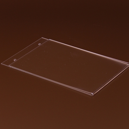 Három oldalon nyitott, alul zárt, falra szerelhető plexi laptartó. A laptartóba oldalról lehet becsúsztatni a papírlapot.