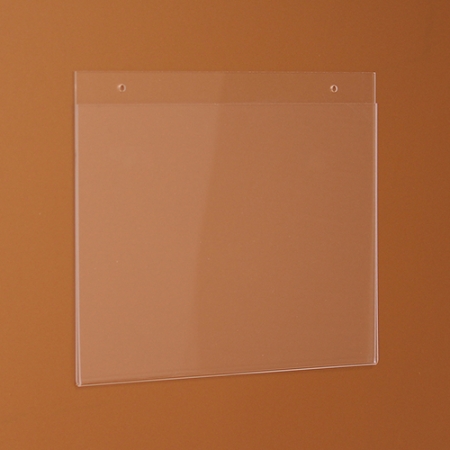 Három oldalon nyitott, alul zárt, falra szerelhető plexi laptartó. A laptartóba oldalról lehet becsúsztatni a papírlapot.